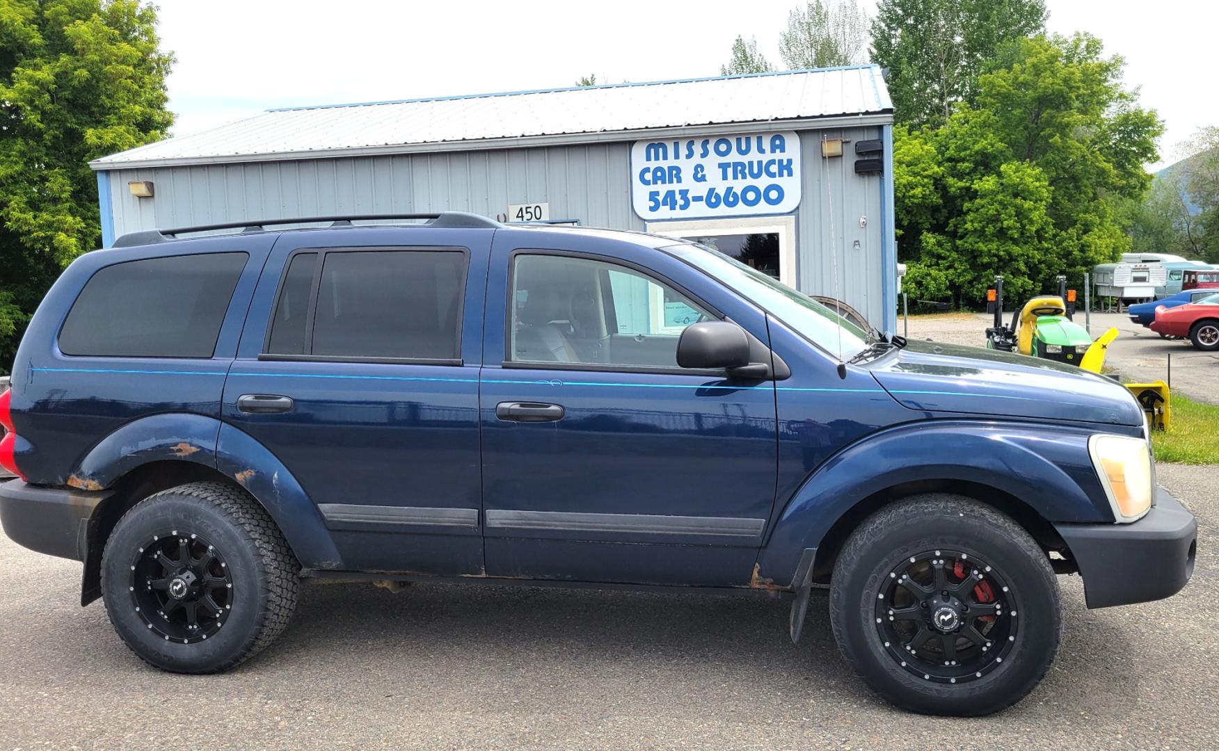 2005 Blue /GrAY Dodge Durango ST (1D4HB38N05F) with an 4.7L V8 engine, Automatic transmission, located at 450 N Russell, Missoula, MT, 59801, (406) 543-6600, 46.874496, -114.017433 - Looks a little rough but runs well. 4 Wheel Drive Works. 4.7V8 Engine. Automatic Transmission. 3RD Row Seating. Nice Wheels. Power Windows and Locks. Does have a Check Engine light on P0058. financing is NOT Available. - Photo#0